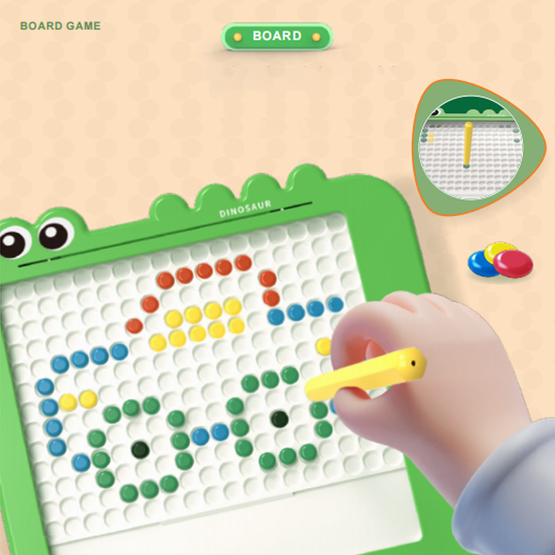 Kid using magnetic drawing board