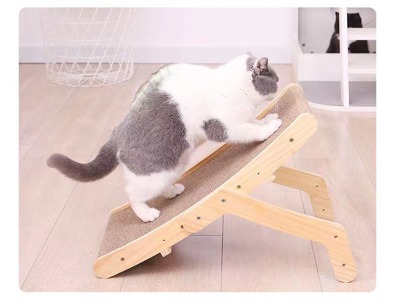 Cat using Wooden Scratcher and Bed