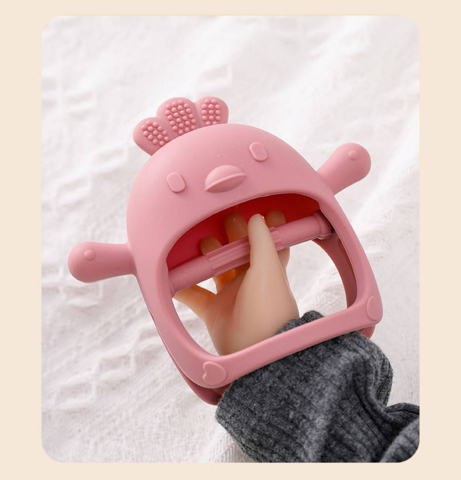 Baby Using Teething Glove