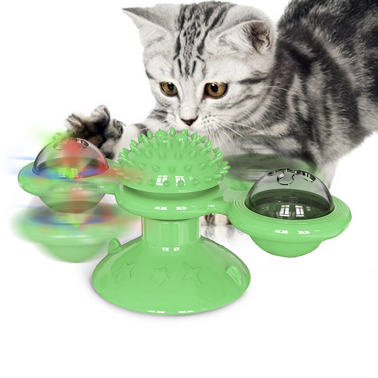 Cat Playing with Interactive Windmill Toy