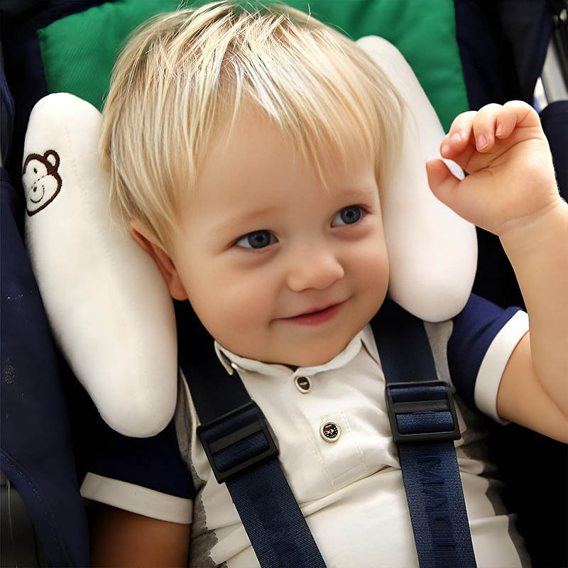Neck pillow on stroller harness